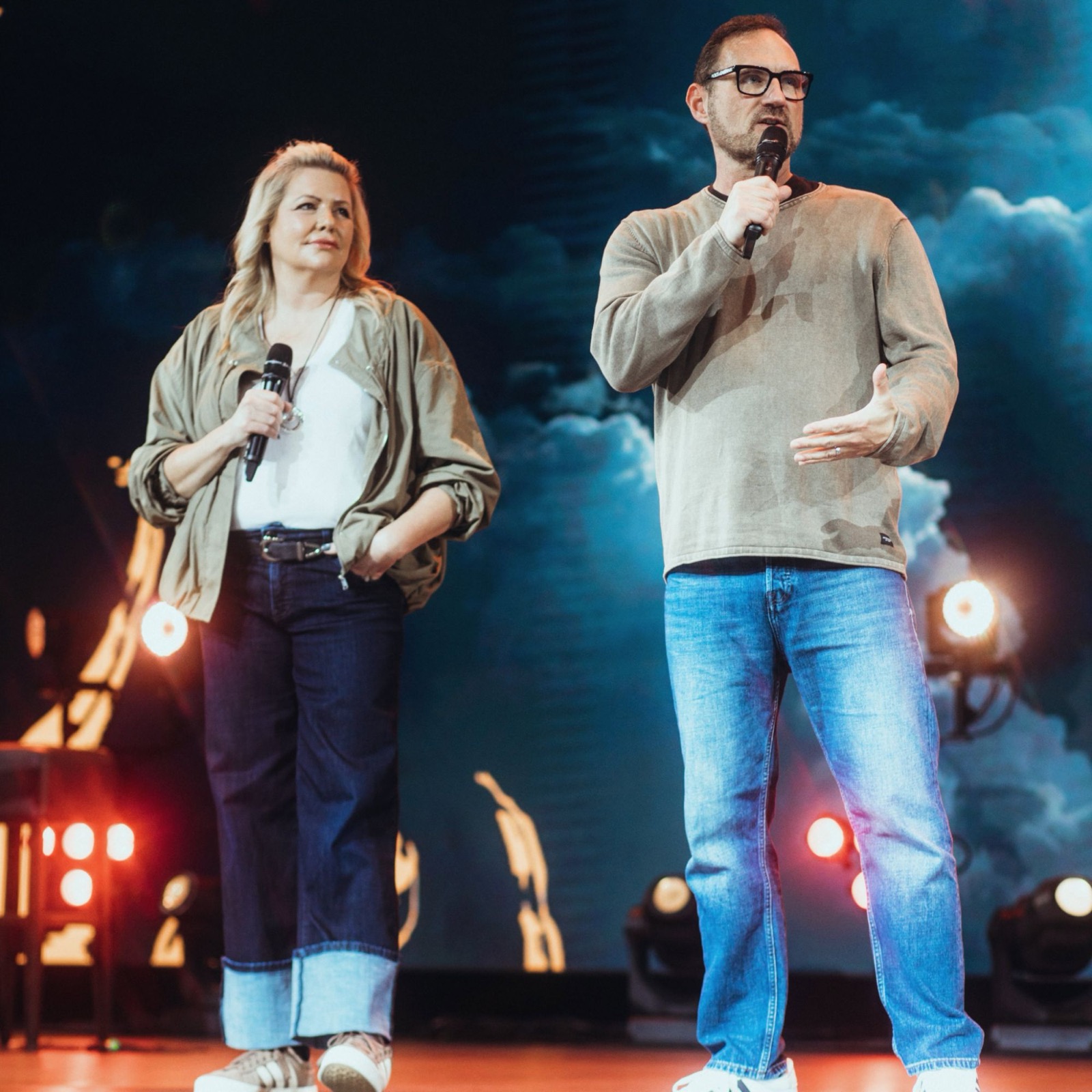 Bob and Erica Hazlett speaking on stage